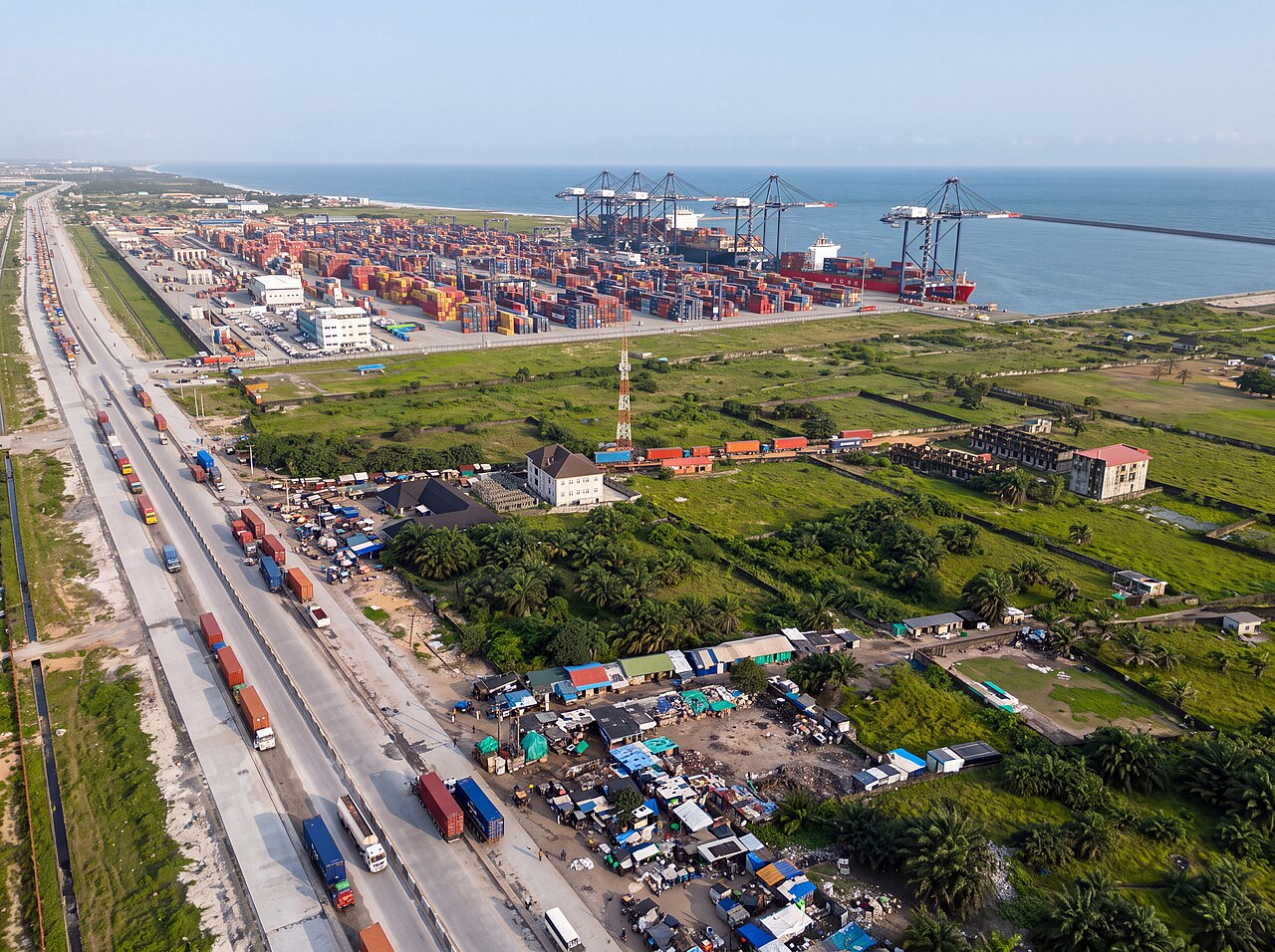 Aerial view of Lekki Port in Nigeria with containers, cranes and a cargo ship